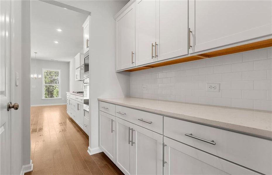 Furnished interior view inside a new home in Reunion, Flowery Branch (Image 12).