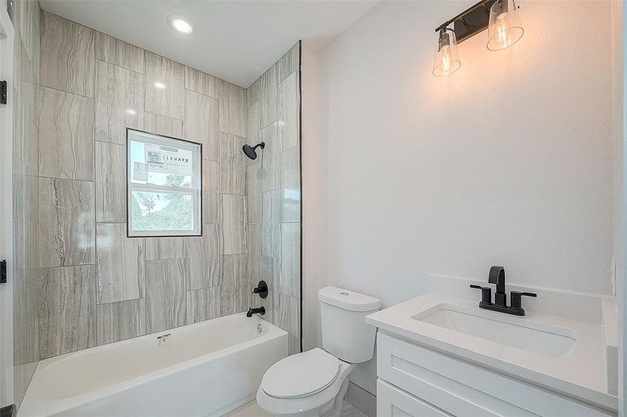 The secondary bathroom features a bath/shower combo. Ready for your daily needs.