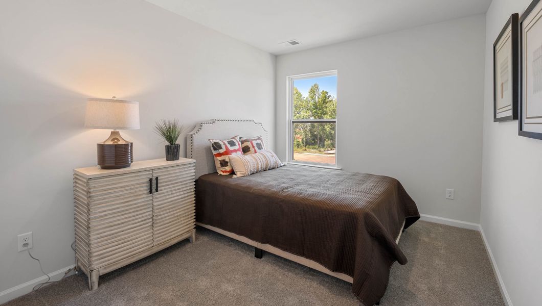 Furnished interior view inside a new home in Tanglewood Townes, Greenville (Image 15).
