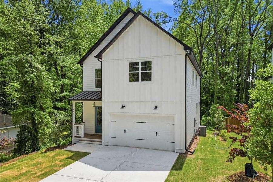 Front exterior of a new home in , Marietta, GA, highlighting curb appeal (Image 2). Front exterior of a new home in , Marietta, GA, highlighting curb appeal (Image 2).