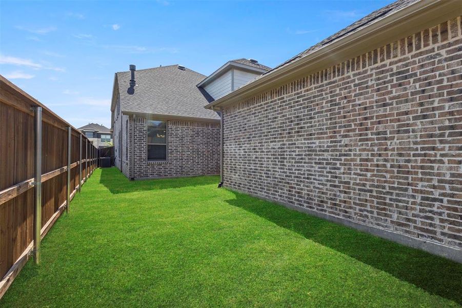 Front exterior of a new home in Mustang Lakes 74', Celina, TX, highlighting curb appeal (Image 22).