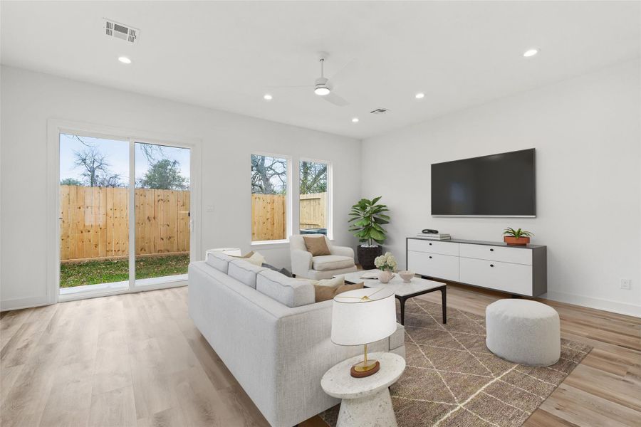 Spacious living area with backyard views and great natural light.
