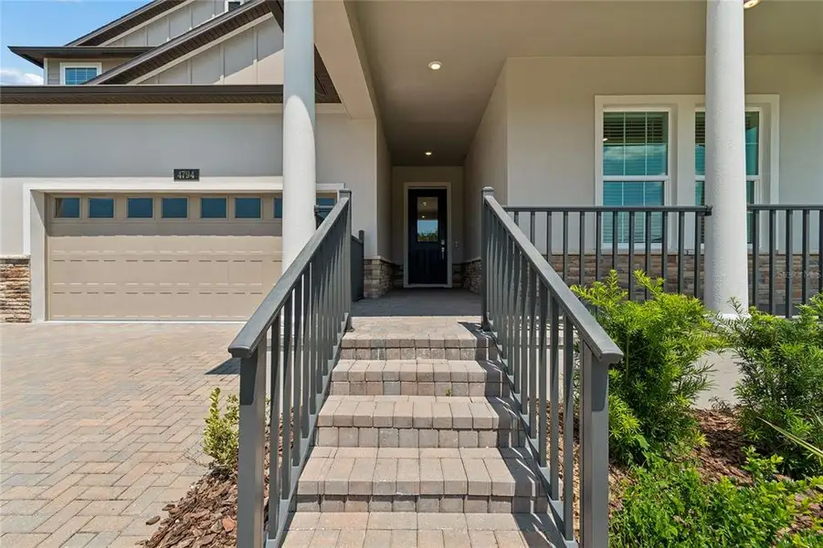 Exterior details and patio area of a home in , Brooksville (Image 3).