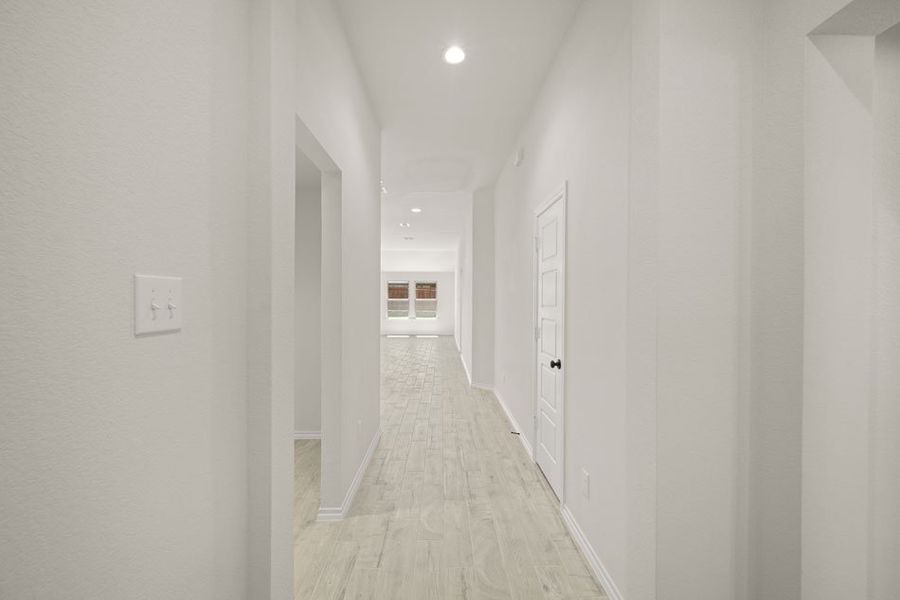 Front exterior of a new home in Baker Farms, Cleburne, TX, highlighting curb appeal (Image 25). Front exterior of a new home in Baker Farms, Cleburne, TX, highlighting curb appeal (Image 25).