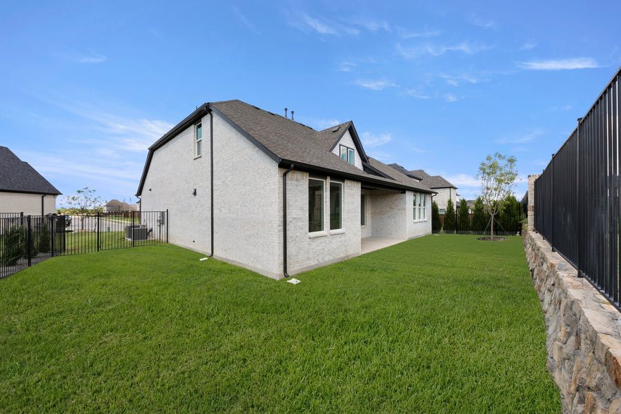 Exterior details and patio area of a home in Nelson Lake Estates, Rockwall (Image 2).