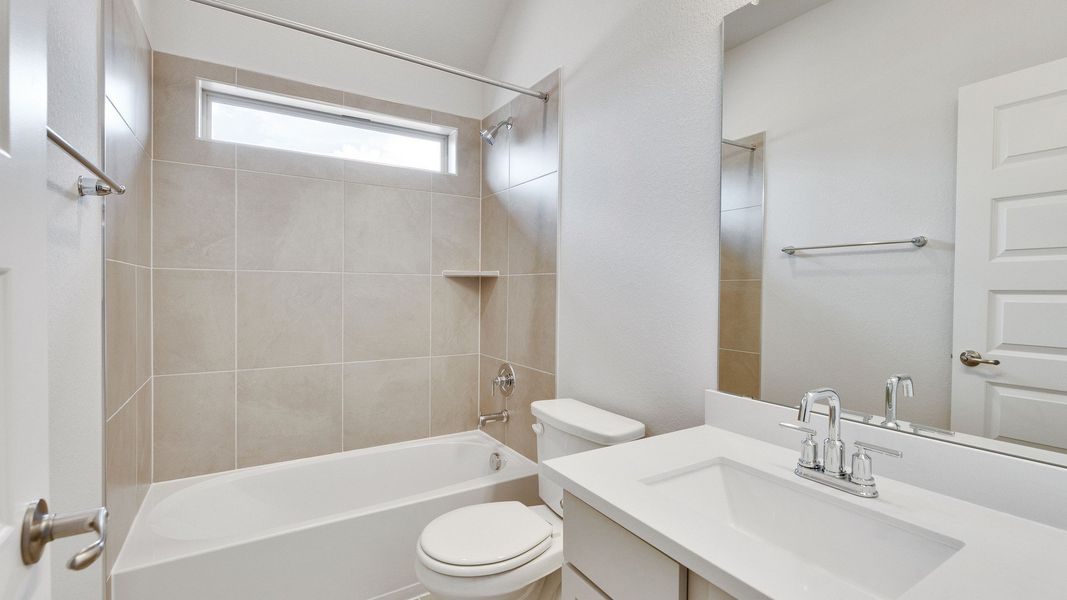 Furnished interior view inside a new home in Oaks at San Gabriel, Georgetown (Image 30).