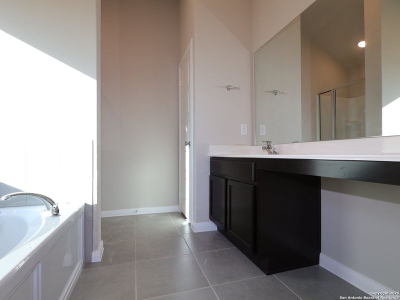 Furnished interior view inside a new home in Hunters Ranch, San Antonio (Image 14).