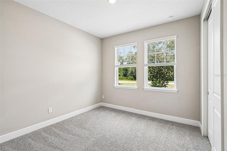 Spacious, unfurnished interior of a new home in Legends Preserve - Signature Series, Daytona Beach (Image 23).