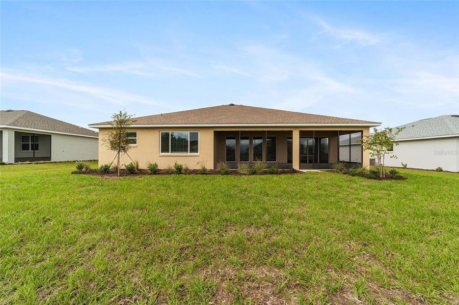 Front exterior of a new home in On Top of the World Communities, Ocala, FL, highlighting curb appeal (Image 21). Front exterior of a new home in On Top of the World Communities, Ocala, FL, highlighting curb appeal (Image 21).