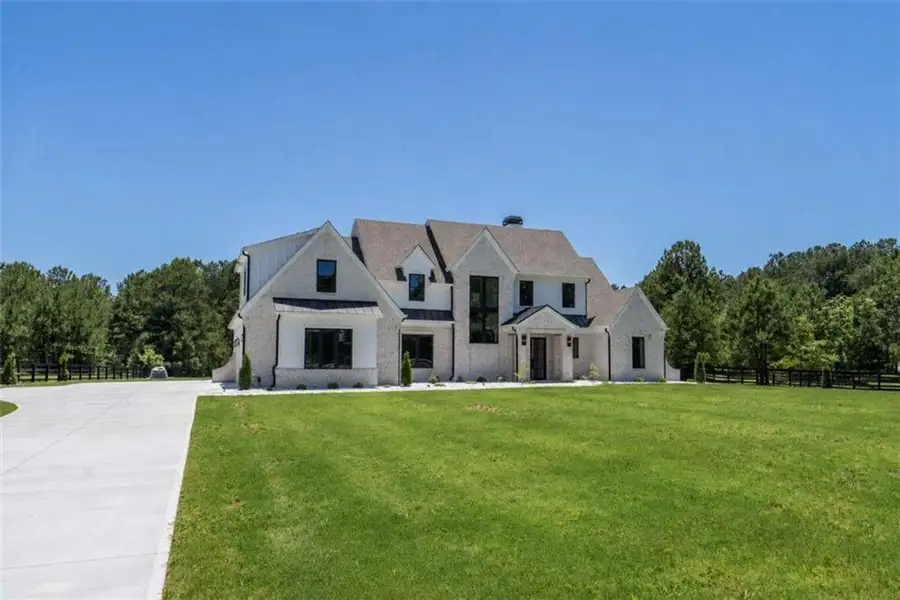 Front exterior of a new home in , Monroe, GA, highlighting curb appeal (Image 30). Front exterior of a new home in , Monroe, GA, highlighting curb appeal (Image 30).
