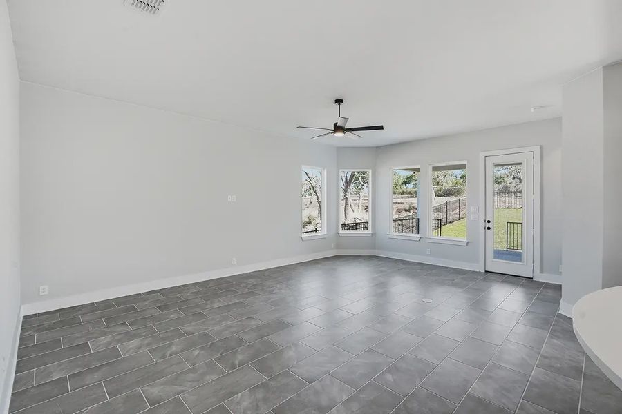 Representative unfurnished interior of a home built from the Archer by Chesmar Homes in Alsatian Oaks, Castroville (Image 13).