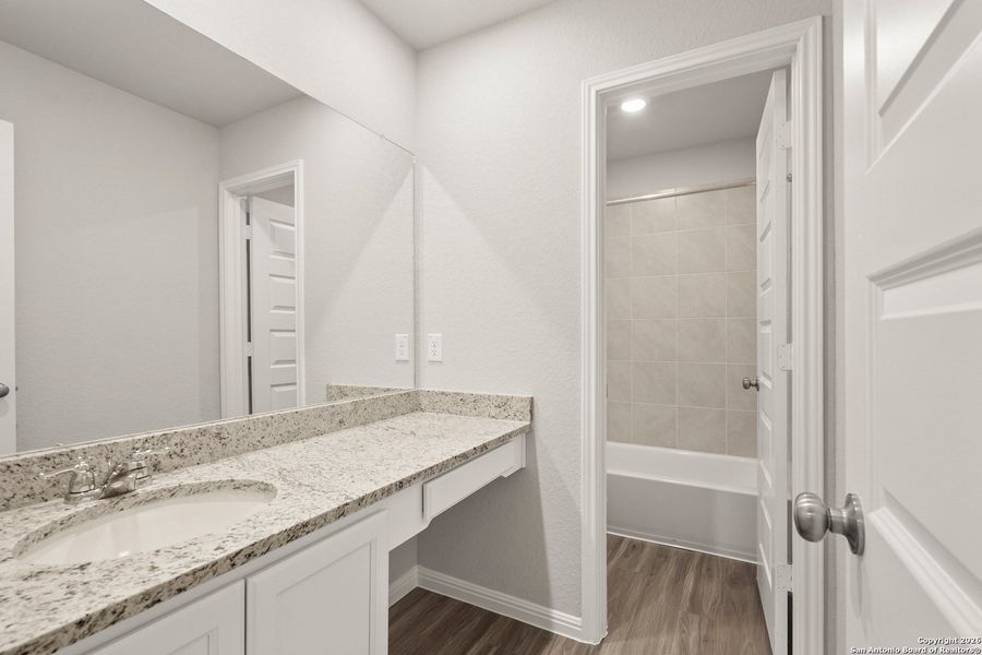 Furnished interior view inside a new home in Cinco Lakes, San Antonio (Image 9).