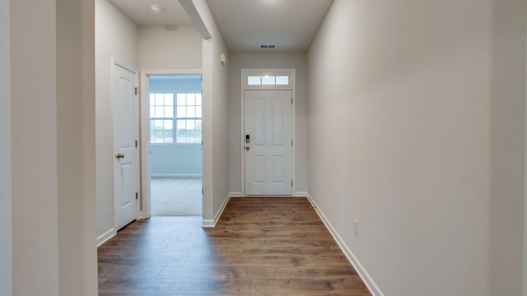 Spacious, unfurnished interior of a new home in The Parks, White House (Image 20).