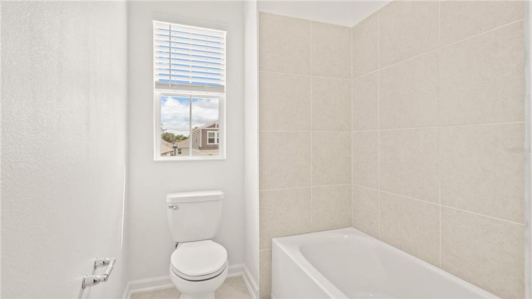 Furnished interior view inside a new home in Bridgewalk, St. Cloud (Image 2).