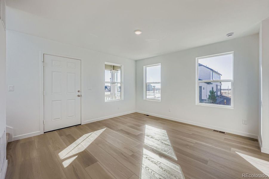 Spacious, unfurnished interior of a new home in Percheron: The Explorer Collection, Colorado Springs (Image 9).