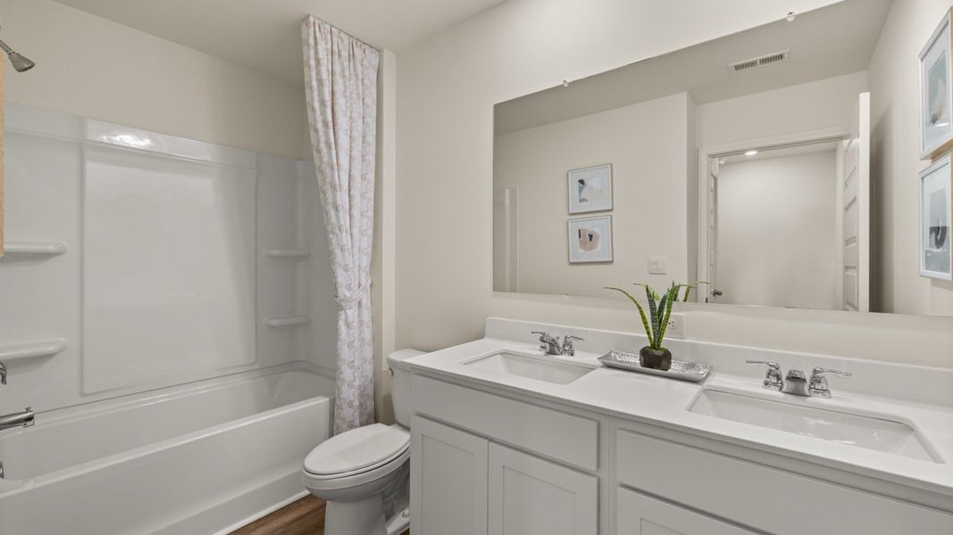 Representative furnished interior of a home built from the Hamlin by D.R. Horton in Oakchase at Hampton, Hampton (Image 26).