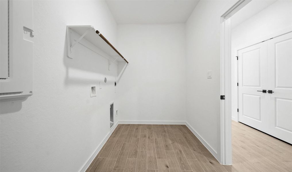 Laundry room (*Photo not of actual home and used for illustration purposes only.)