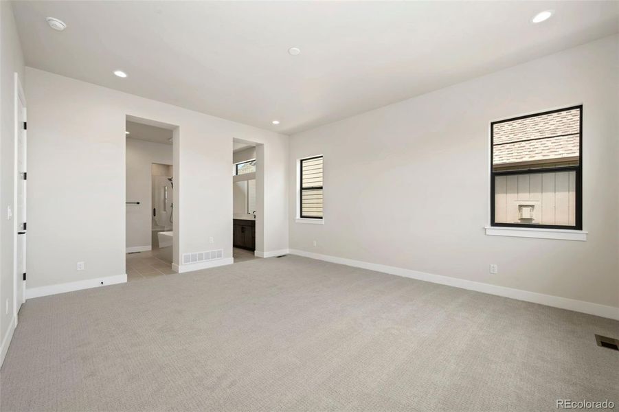 Spacious, unfurnished interior of a new home in The Fairways at RainDance, Windsor (Image 10).