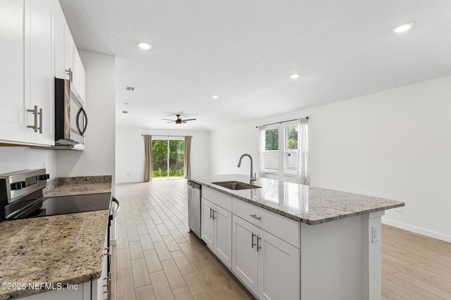 Furnished interior view inside a new home in Lakes at Bella Lago – Classic Series, Green Cove Springs (Image 6).