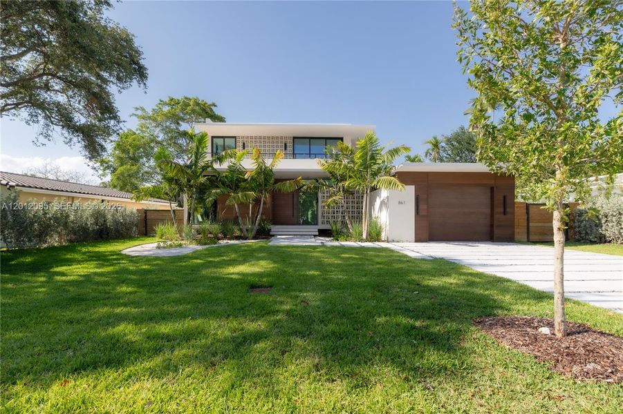 Front exterior of a new home in , Miami Shores, FL, highlighting curb appeal (Image 2). Front exterior of a new home in , Miami Shores, FL, highlighting curb appeal (Image 2).