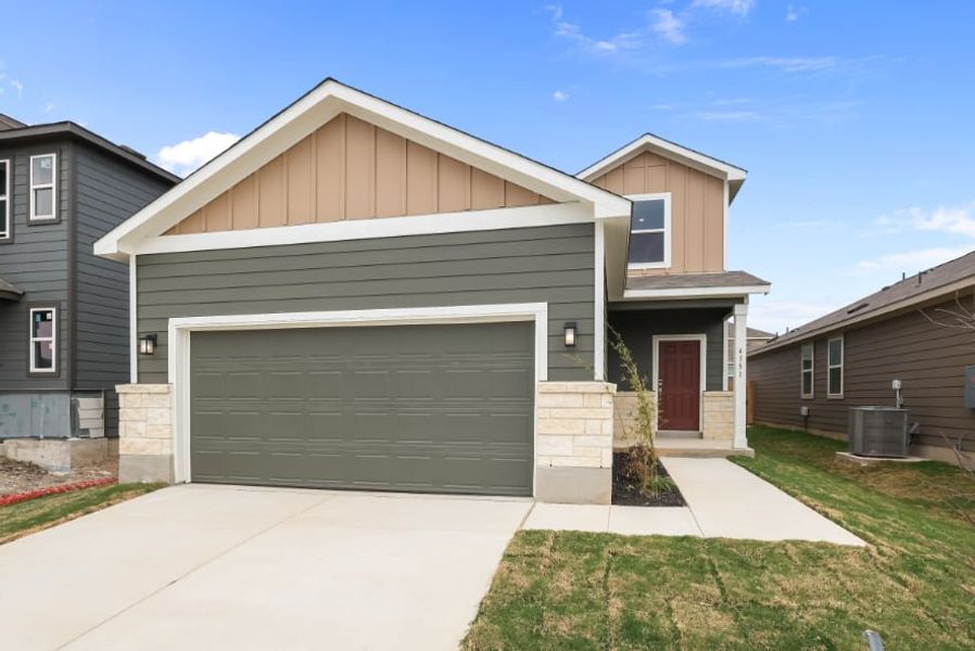 Front exterior of a new home in Applewhite Meadows, San Antonio, TX, highlighting curb appeal (Image 1). Front exterior of a new home in Applewhite Meadows, San Antonio, TX, highlighting curb appeal (Image 1).