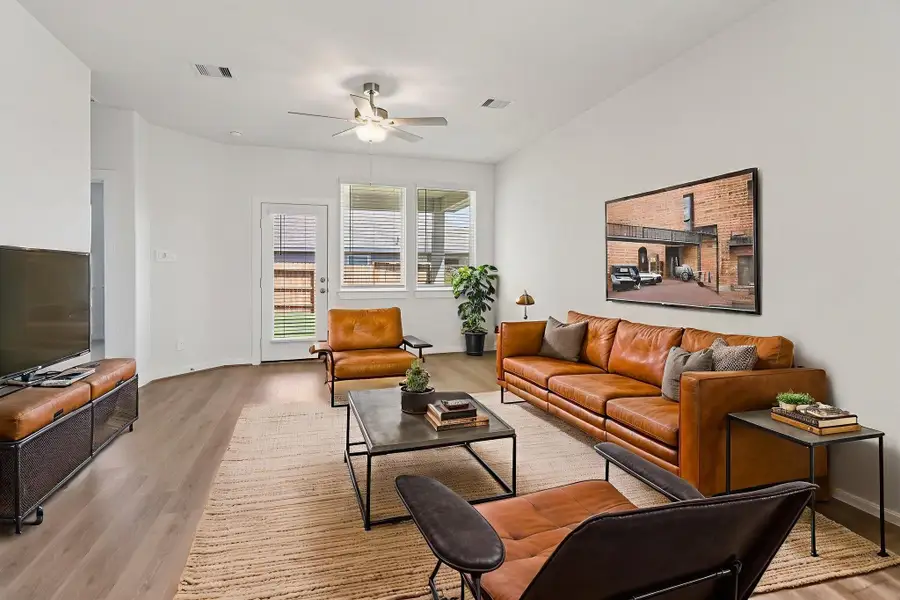 Furnished interior view inside a new home in Pine Lake Cove - Traditional Series, Montgomery (Image 9).