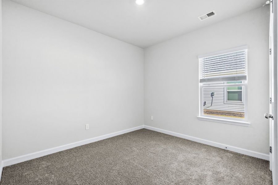 Spacious, unfurnished interior of a new home in Cypress Ridge - The Boardwalk Series, Longs (Image 21).