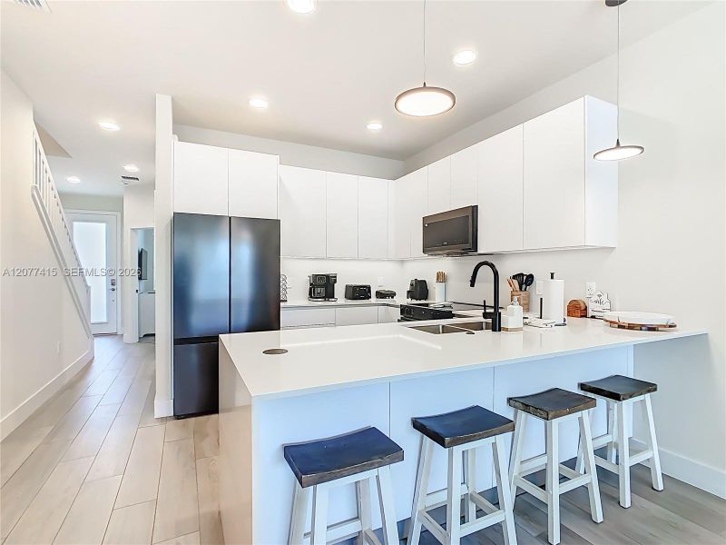 Furnished interior view inside a new home in , Clermont (Image 7).