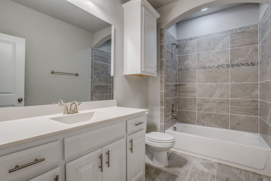 Representative furnished interior of a home built from the Burlington II by Megatel Homes in Santorini, Seagoville (Image 6).
