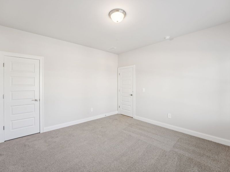 Spacious, unfurnished interior of a new home in Hemingway - Highland Series, Cumming (Image 15).