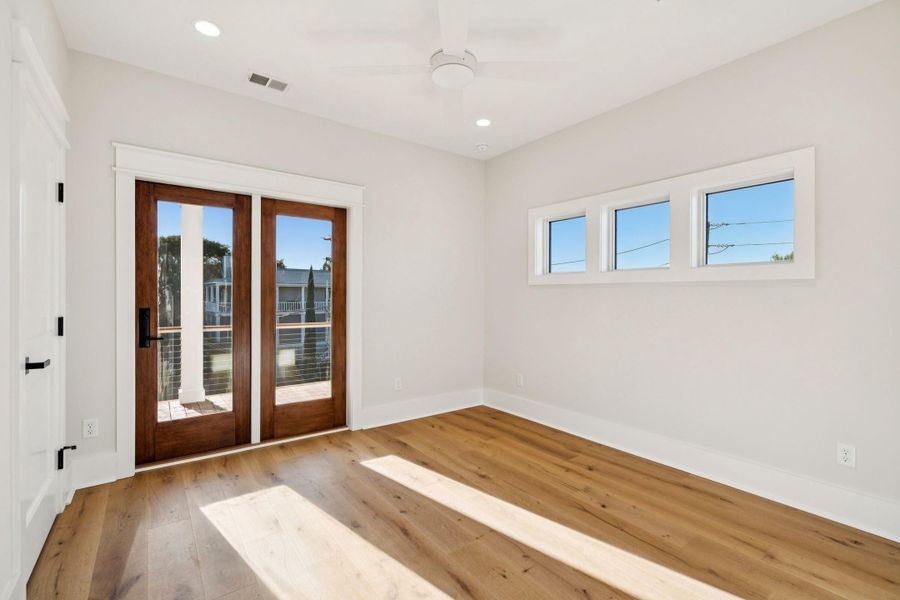 Spacious, unfurnished interior of a new home in , Isle Of Palms (Image 26). Spacious, unfurnished interior of a new home in , Isle Of Palms (Image 26).
