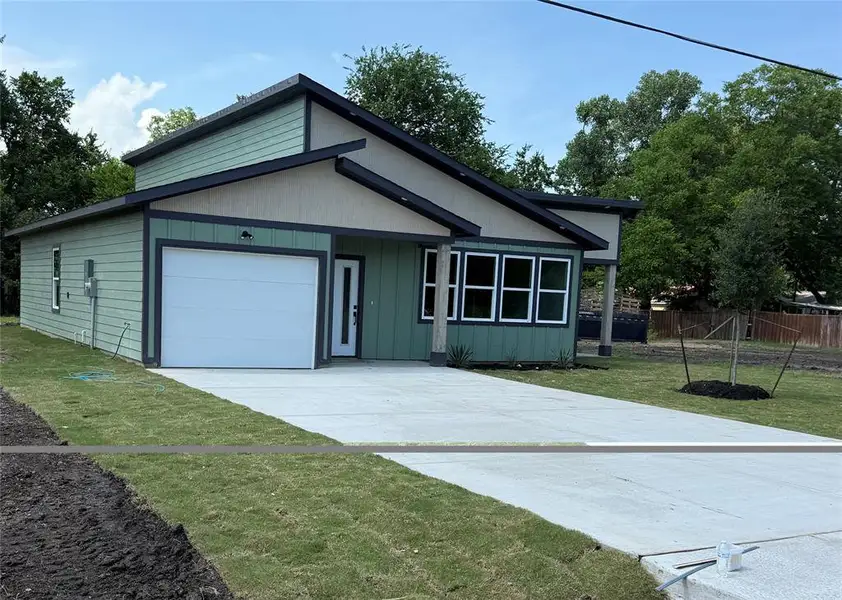 Front exterior of a new home in , Cooper, TX, highlighting curb appeal (Image 18).