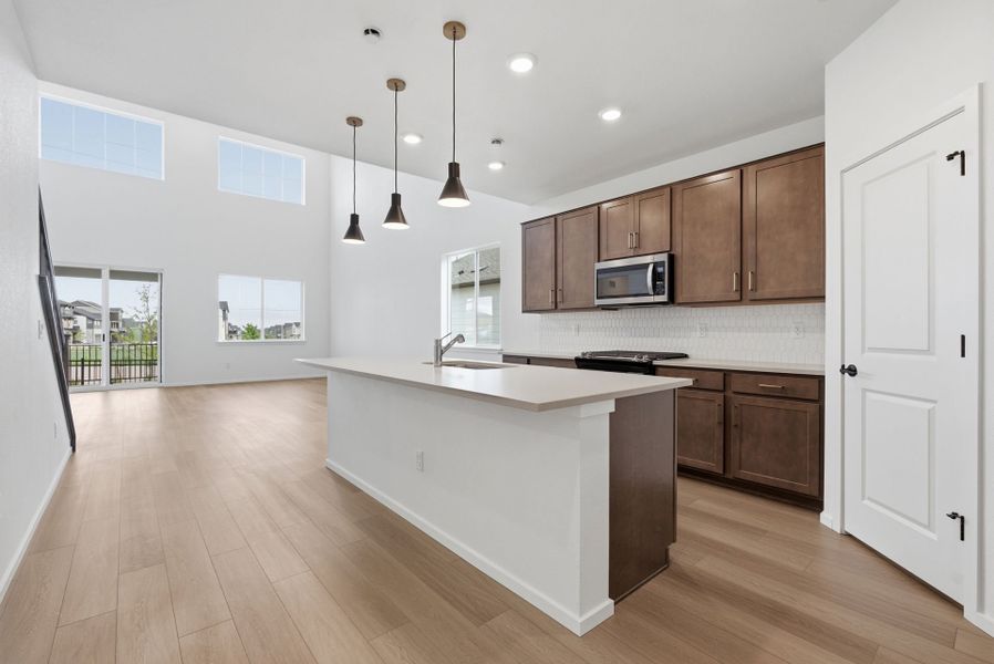 Furnished interior view inside a new home in Harvest Crossing, Aurora (Image 4).