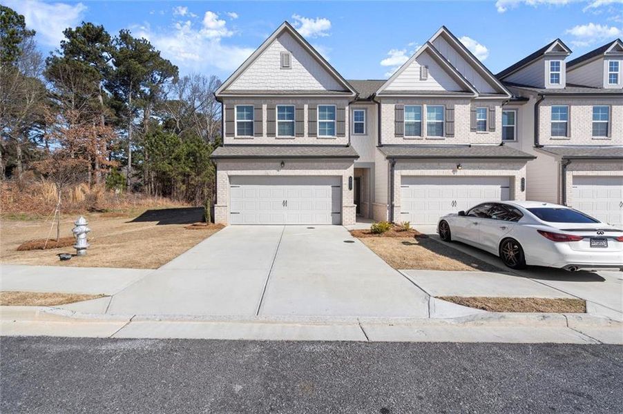 Front exterior of a new home in Residences at Gateway, Bethlehem, GA, highlighting curb appeal (Image 21).