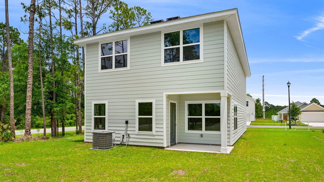 Exterior details and patio area of a home in Chateau Nemours, Port Saint Joe (Image 3).