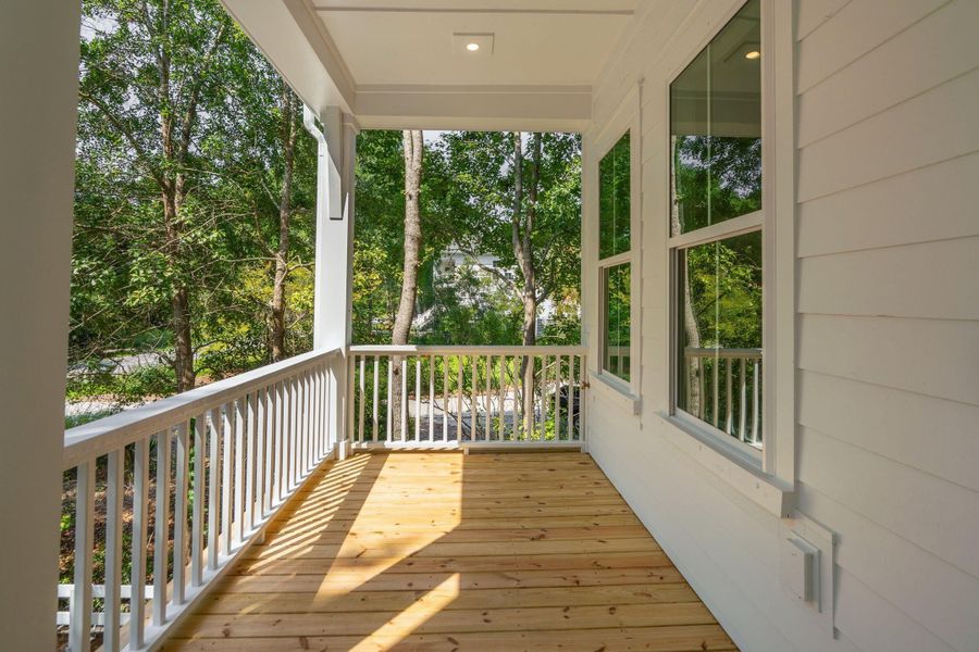 Exterior details and patio area of a home in , Johns Island (Image 35).