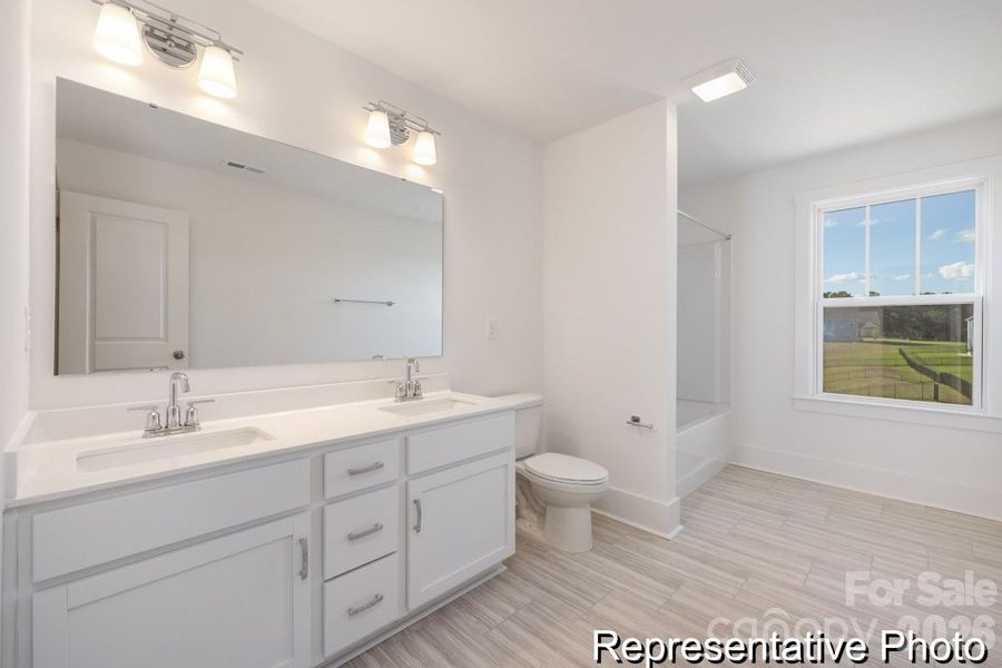 Furnished interior view inside a new home in Whispering Hills, Locust (Image 26).