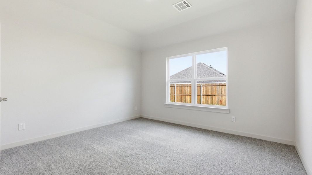 Furnished interior view inside a new home in Patriot Estates, Venus (Image 39).