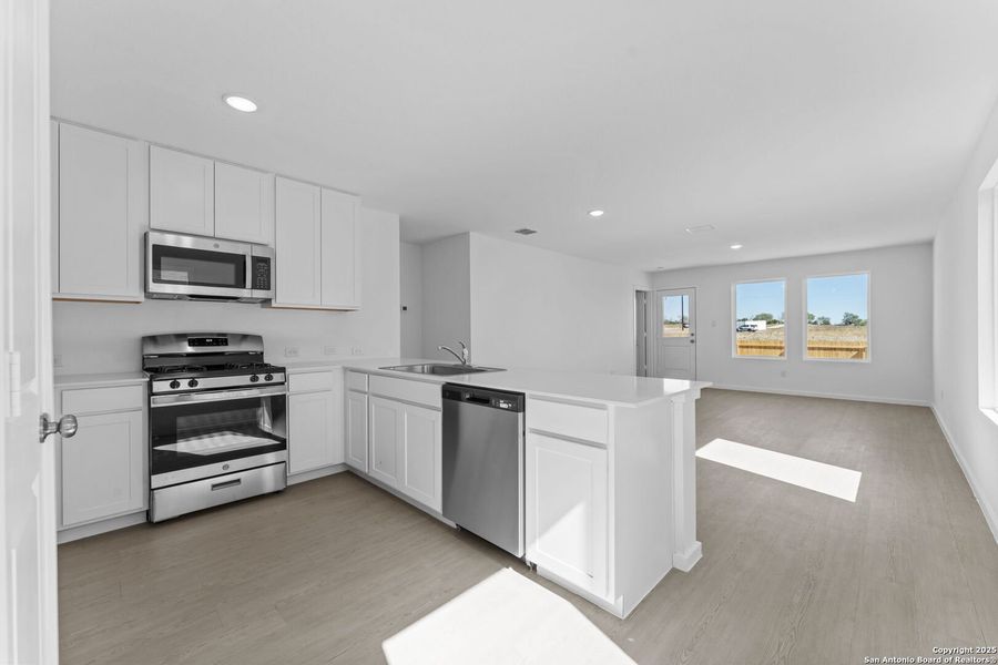 Furnished interior view inside a new home in Randolph Crossing: Cottage Collection, Converse (Image 6). Furnished interior view inside a new home in Randolph Crossing: Cottage Collection, Converse (Image 6).