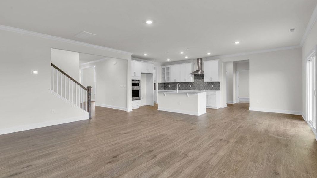 Representative unfurnished interior of a home built from the NORMAN by D.R. Horton in Eagle Creek, Fuquay Varina (Image 11).