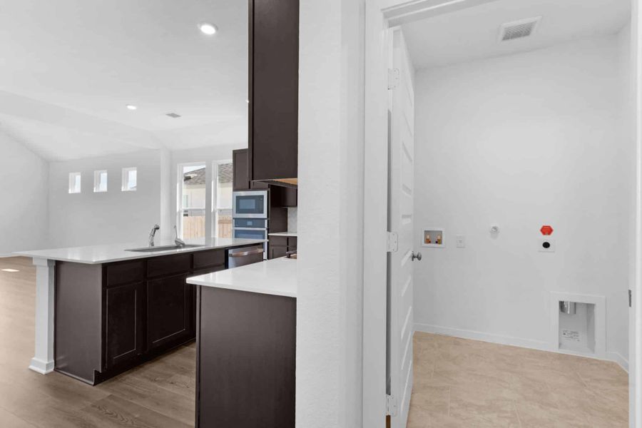 Furnished interior view inside a new home in Briarwood, Elgin (Image 9).