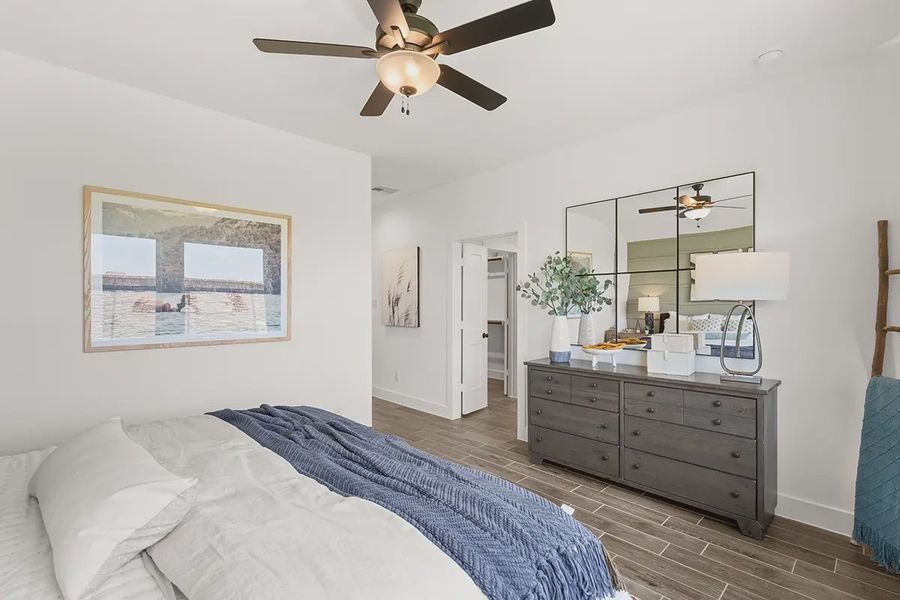 Representative furnished interior of a home built from the Countryside by Chesmar Homes in Meridiana Townhomes, Iowa Colony (Image 20).