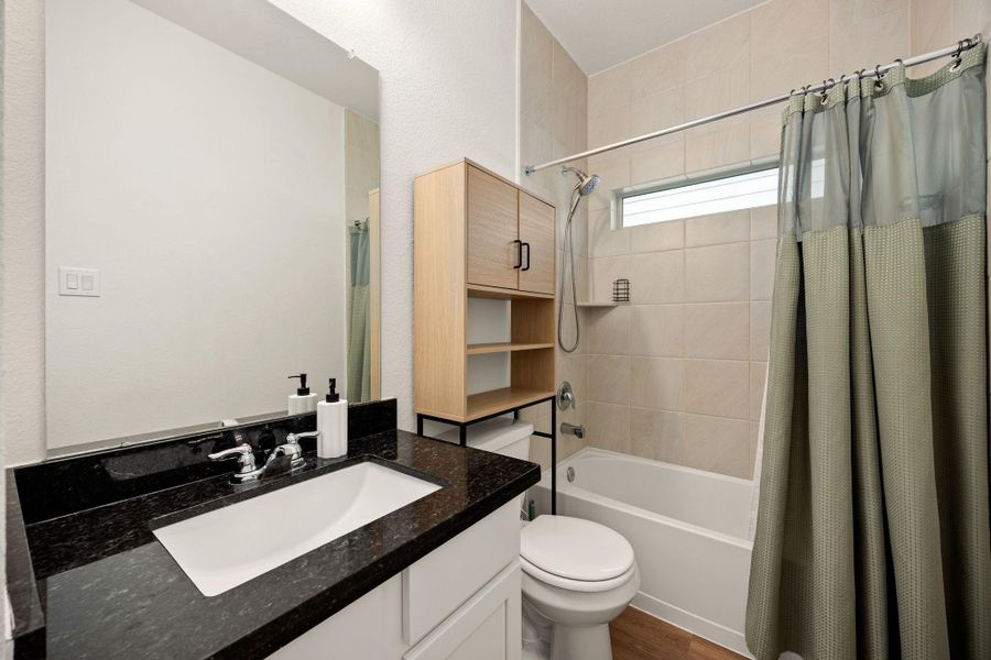 Furnished interior view inside a new home in Willowpoint, Tomball (Image 11).