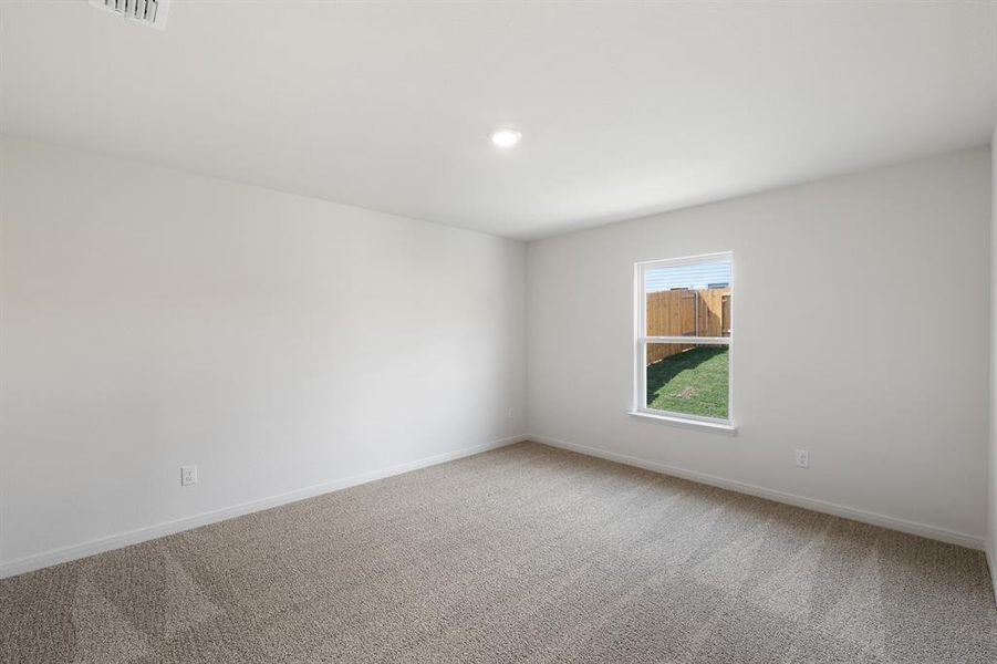 Empty room featuring carpet floors