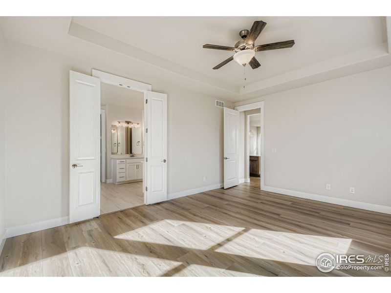 Spacious, unfurnished interior of a new home in RainDance National 60/70, Windsor (Image 21).