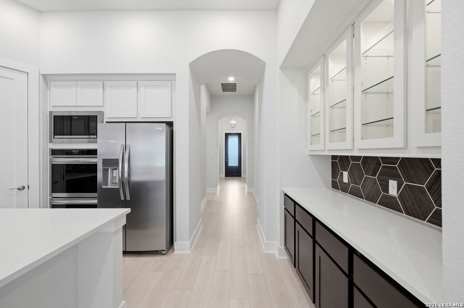 Furnished interior view inside a new home in Weston Oaks, San Antonio (Image 7).