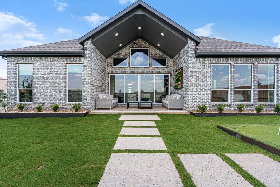 Exterior details and patio area of a home in Lariat, Liberty Hill (Image 39).