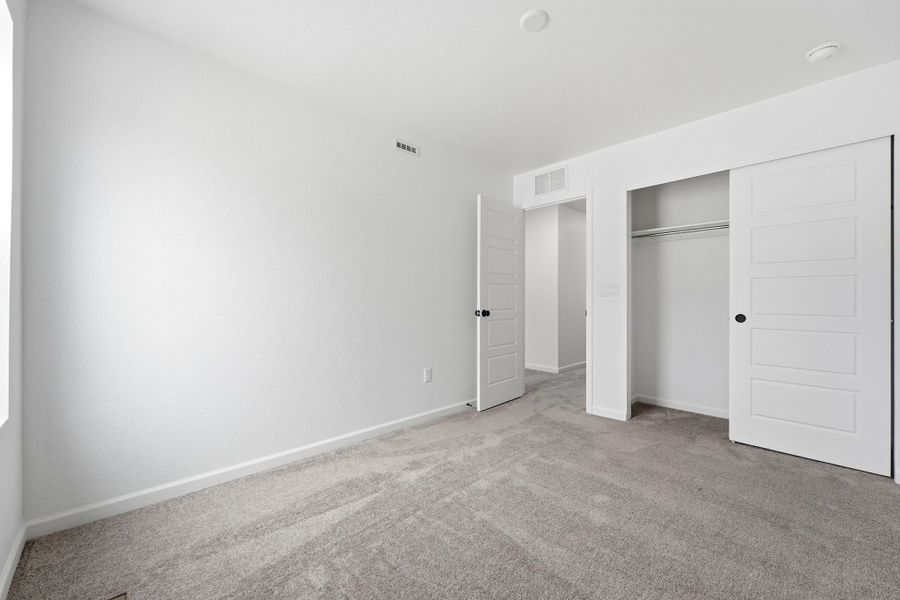 Spacious, unfurnished interior of a new home in Trailstone Townhomes - The Westerly Collection, Arvada (Image 17).