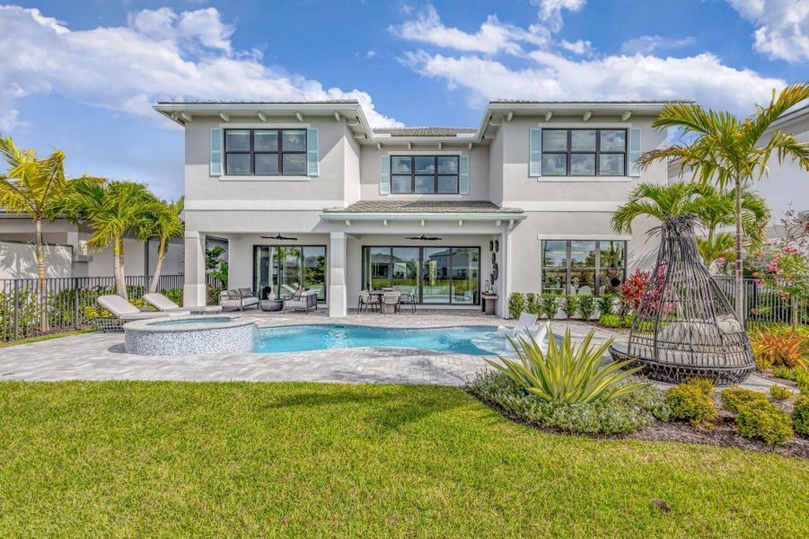 Exterior details and patio area of a home in Apex at Avenir, Palm Beach Gardens (Image 26).