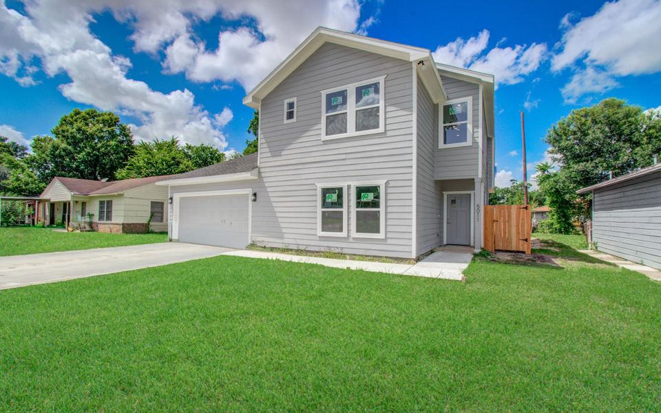 Front exterior of a new home in , Houston, TX, highlighting curb appeal (Image 23).
